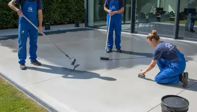 Professional concrete staining on Tampa, FL patio showing durable decorative finish by local painters