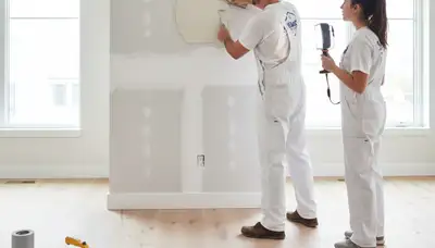 Professional drywall repair and wall painting in Tampa, FL home by expert local painters