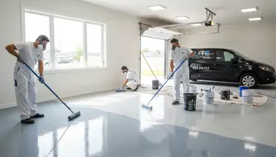 Epoxy floor coating in Tampa FL garage by professional painters for durable, glossy concrete finish
